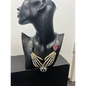 Skull hands with silver glitter and bottle cap necklace choker